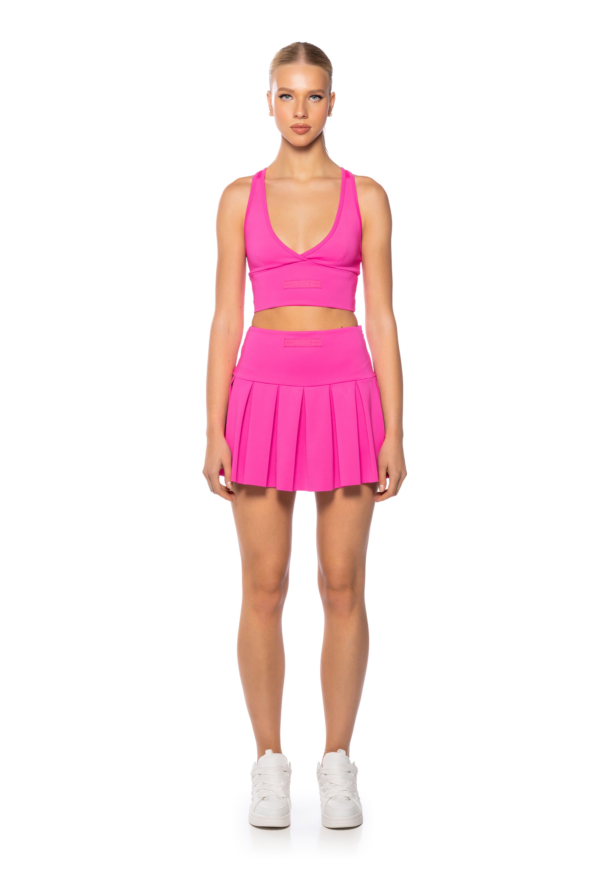 Extra View Basic Luxe Pleated Skort In Neon Pink