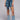 Front View Belted Multi Denim Mini Skort