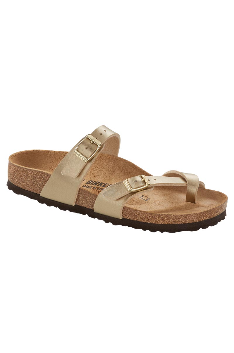 The BIRKENSTOCK MAYARI BF GOLD sandal is depicted with a beige synthetic upper, featuring two adjustable straps and a cork footbed. Designed for comfort and casual wear, it also boasts a textured black rubber sole.