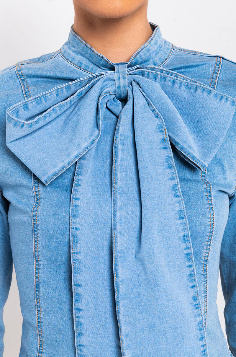 Detail View Bow Down Bish Denim Long Sleeve Top in Blue