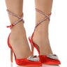 Front View Broken Lines Red Pump With Heart Embellishment