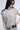 Back View Buckle Up Sleeveless Turtleneck Sweater Top