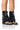 Front View Carla Fold Over Flat Bootie Sandal In Black