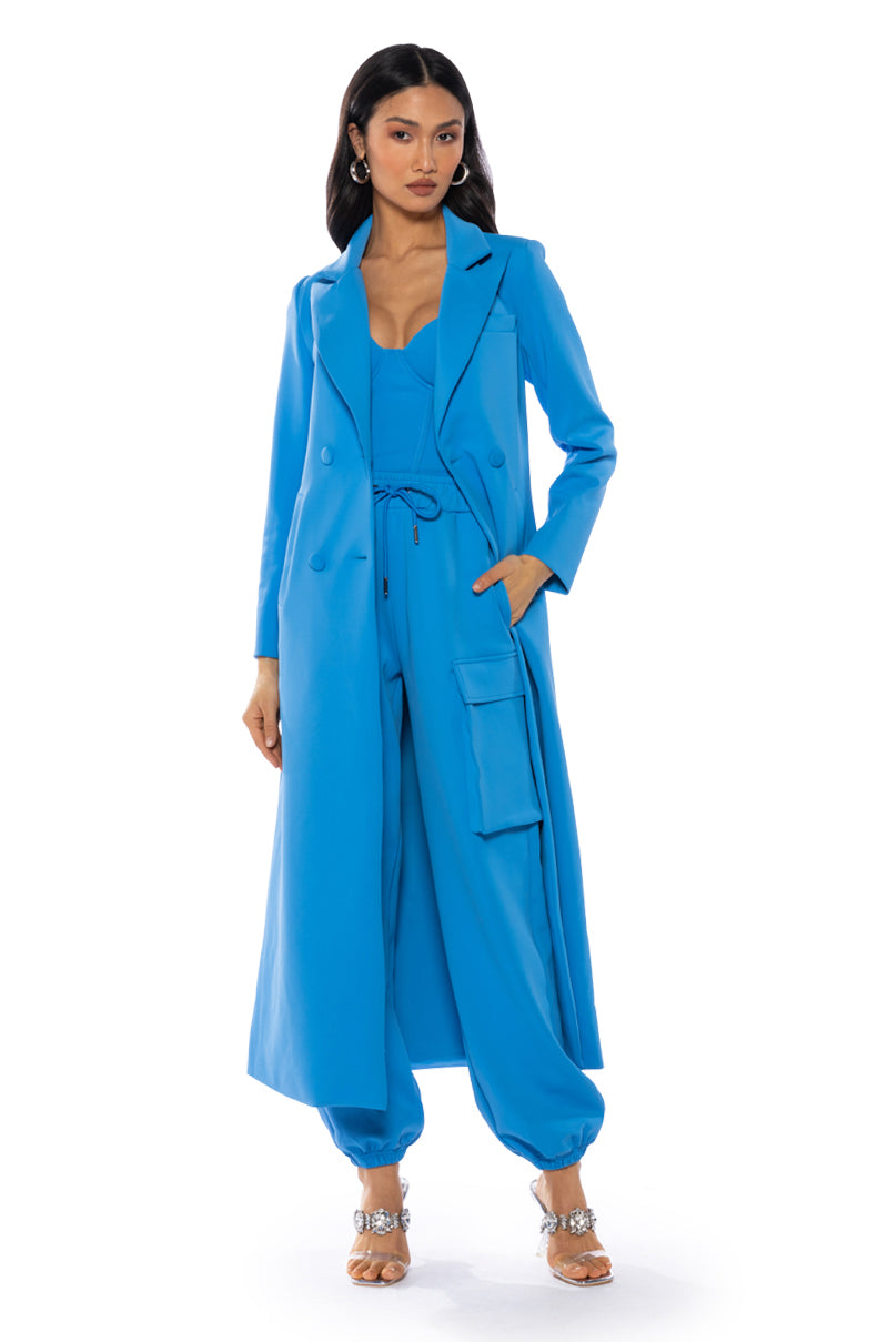 Side View Cocoa Butter Scuba Trench In Blue 3
