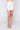 Front View Cosmo Pleather Mini Skirt in Ivory