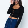 Front View Could Care Less Long Sleeve Lace Up Crop Top in Black