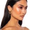 Front View Crushing Hard Textured Hoops In Gold