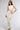 Front View Cut It Out Sleeveless Knit Maxi Dress In White