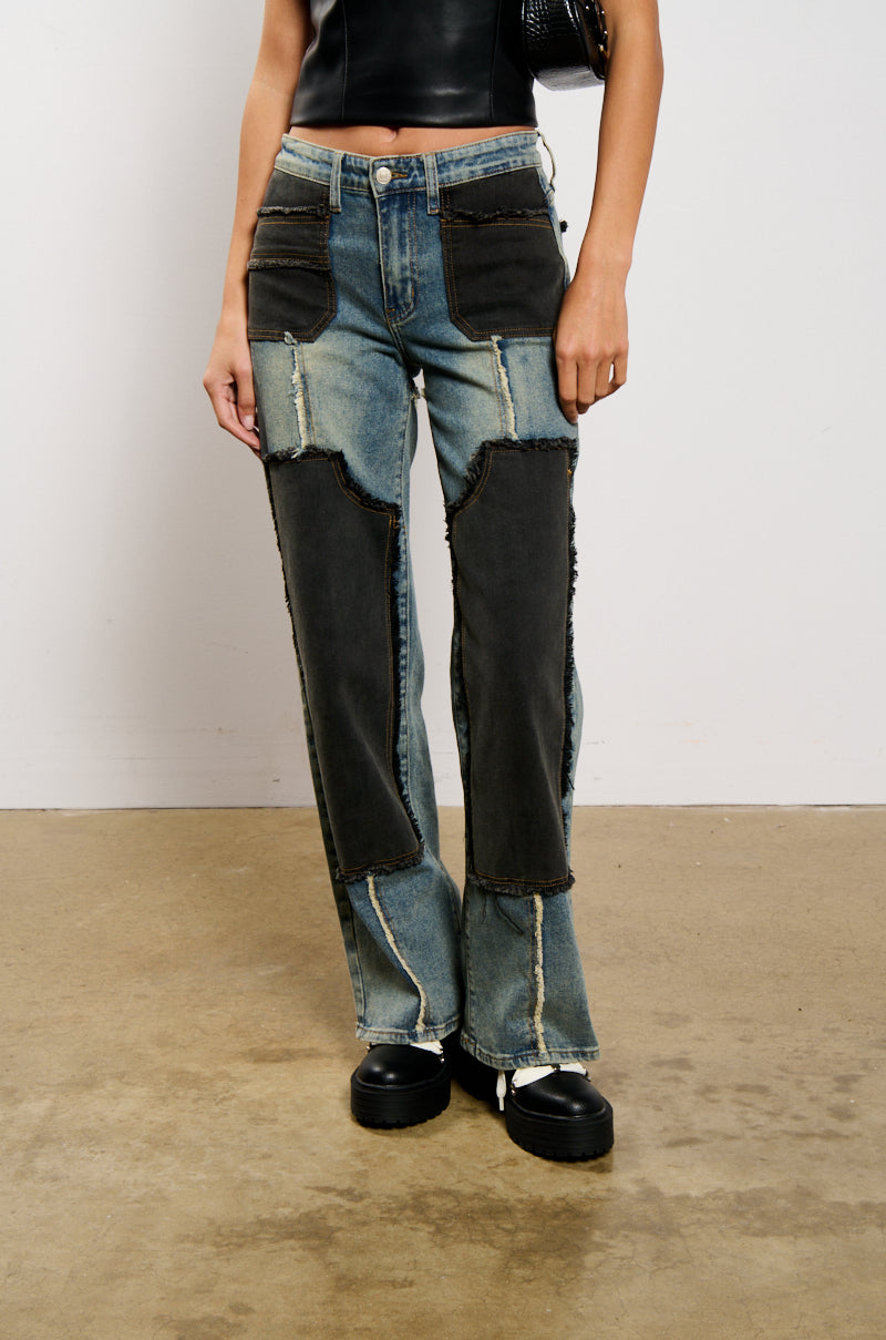 Side View Deep In The Bottom Distressed Denim Pant
