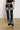 Side View Deep In The Bottom Distressed Denim Pant