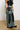 Back View Deep In The Bottom Distressed Denim Pant