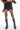 Front View Diabolical Ruched Mesh Zippered Mini Skirt