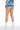Side View Ditzy Daze Patchwork Distress High Rise Denim Shorts