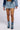 Side View Dump Him Low Rise Denim Mini Skirt