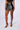 Front View Everybody But Us Faux Leather Mini Skirt With 4 Way Stretch