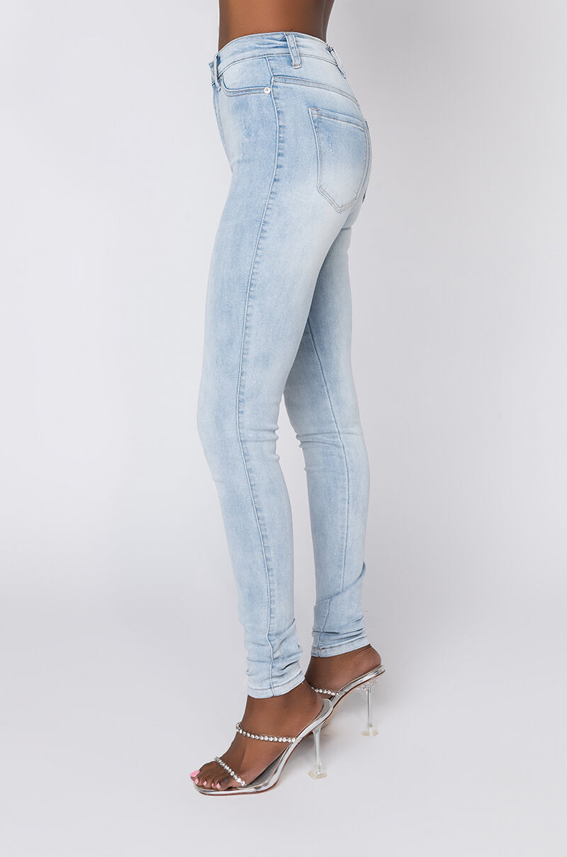 Side View Extreme Stretch High Waisted Skinny Jeans in Light Blue
