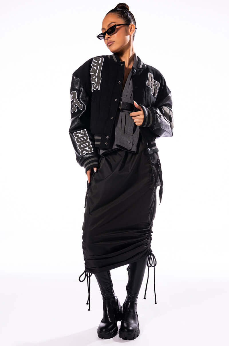 Side View Follow Me Adjustable Cargo Skirt In Black 1