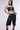 Back View Got Me Twisted T Shirt With Faux Leather Corset Detail