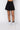 Front View Harbor Pleated Mini Skirt in Black