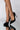 Front View Here To Stay Stiletto Pointed Toe Pump in Black Patent