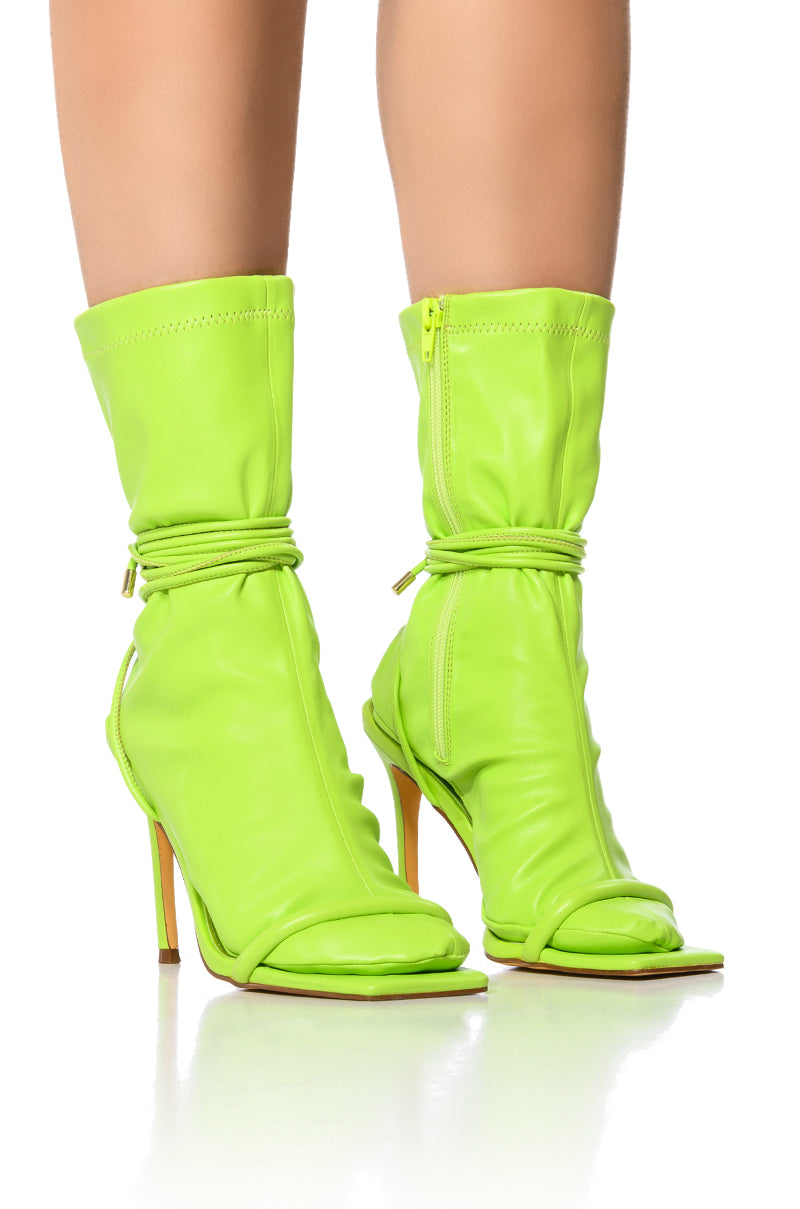 Front View Hot Stuff Stiletto Sock Bootie In Lime