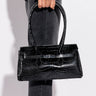 Front View In Motion Croc Purse