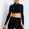 Front View Inside Out Mock Neck Long Sleeve Crop Top in Black White