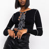 Front View Its Called Magic Tie Front Contrast Trim Crop Top in Black White