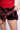 Extra View Let Go Pleated Plaid Mini Skirt In Red