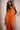 Front View Look Twice Ruched Midi Dress In Orange