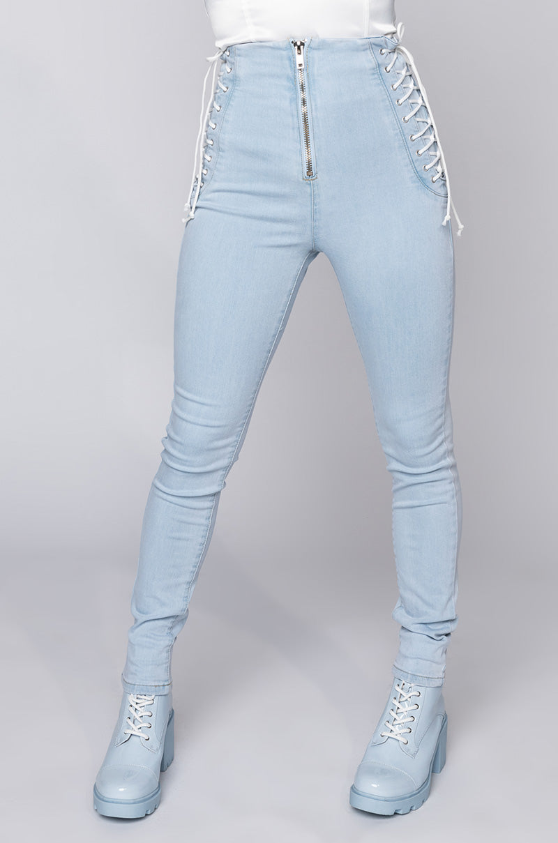 Front View Margot Lace Up Skinny Jeans in Light Blue Denim