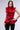 Front View Miss Fashionista Sleeveless Ruffle Peplum Blouse In Red