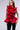 Side View Miss Fashionista Sleeveless Ruffle Peplum Blouse In Red