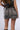 Back View Model Behavior Acid Wash Denim Mini Skirt