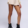 Front View Mystery Girl Mineral Wash Flare Mini Short In Ivory