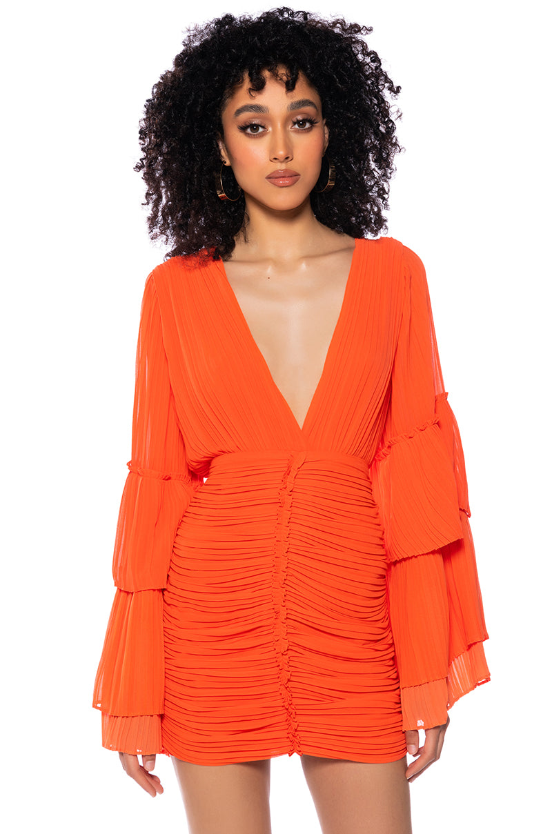 Front View Never Settle Deep V Pleated Long Sleeve Mini Dress
