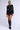 Back View Nothing Phases Me Knit Mini Dress In Black