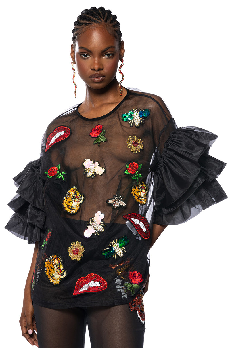 Front View Oh Wow Ruffled Sleeve Embellished Patch Detail Oversized Blouse