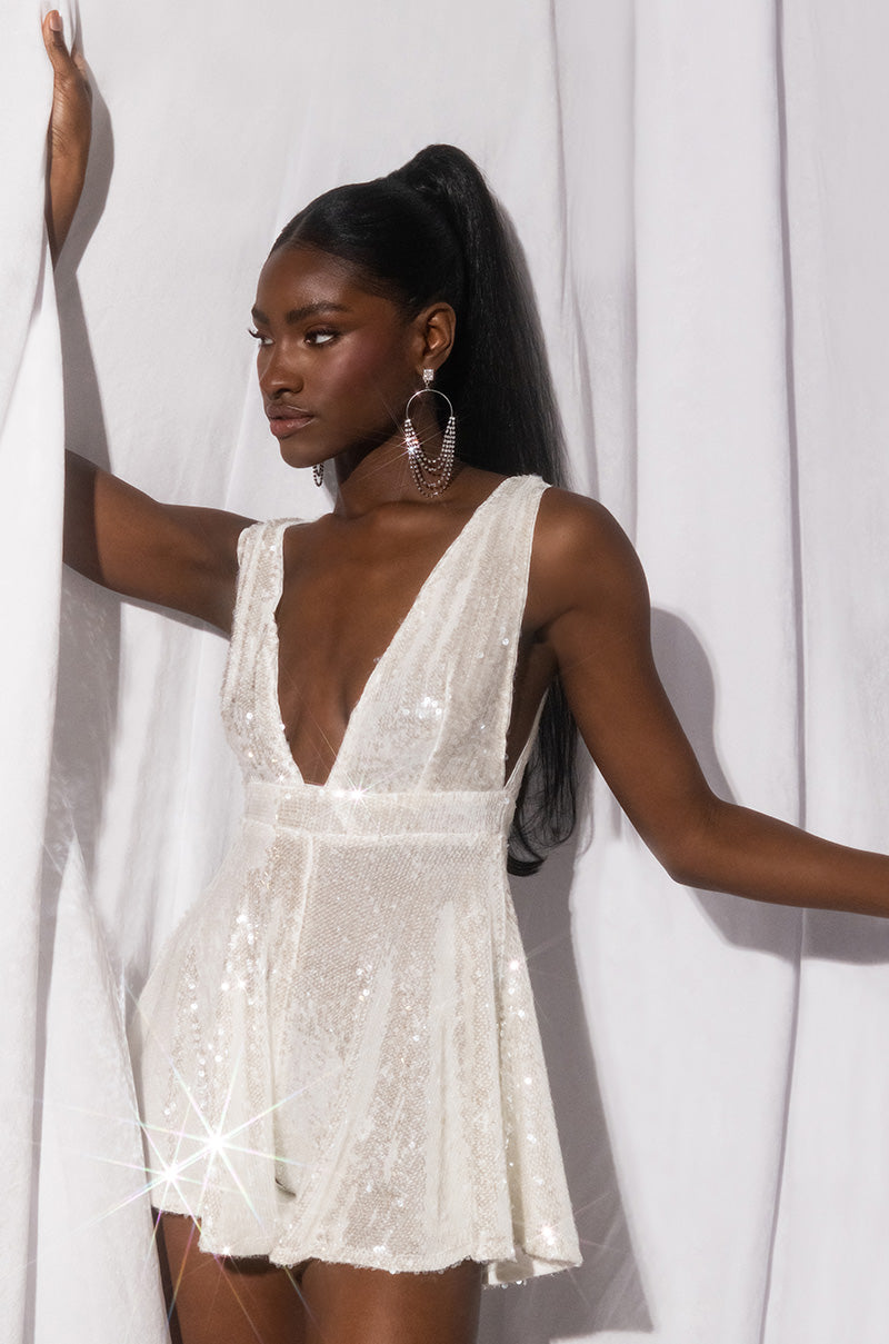 LYLA SLEEVELESS SEQUIN ROMPER IN WHITE AKIRA LYLA SLEEVELESS SEQUIN ROMPER IN WHITE AKIRA