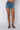 Front View Opposite Direction High Waisted Denim Shorts in Medium Blue Denim