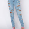 Front View Opposite Direction High Waisted Distressed Skinny Jeans in Light Blue Denim