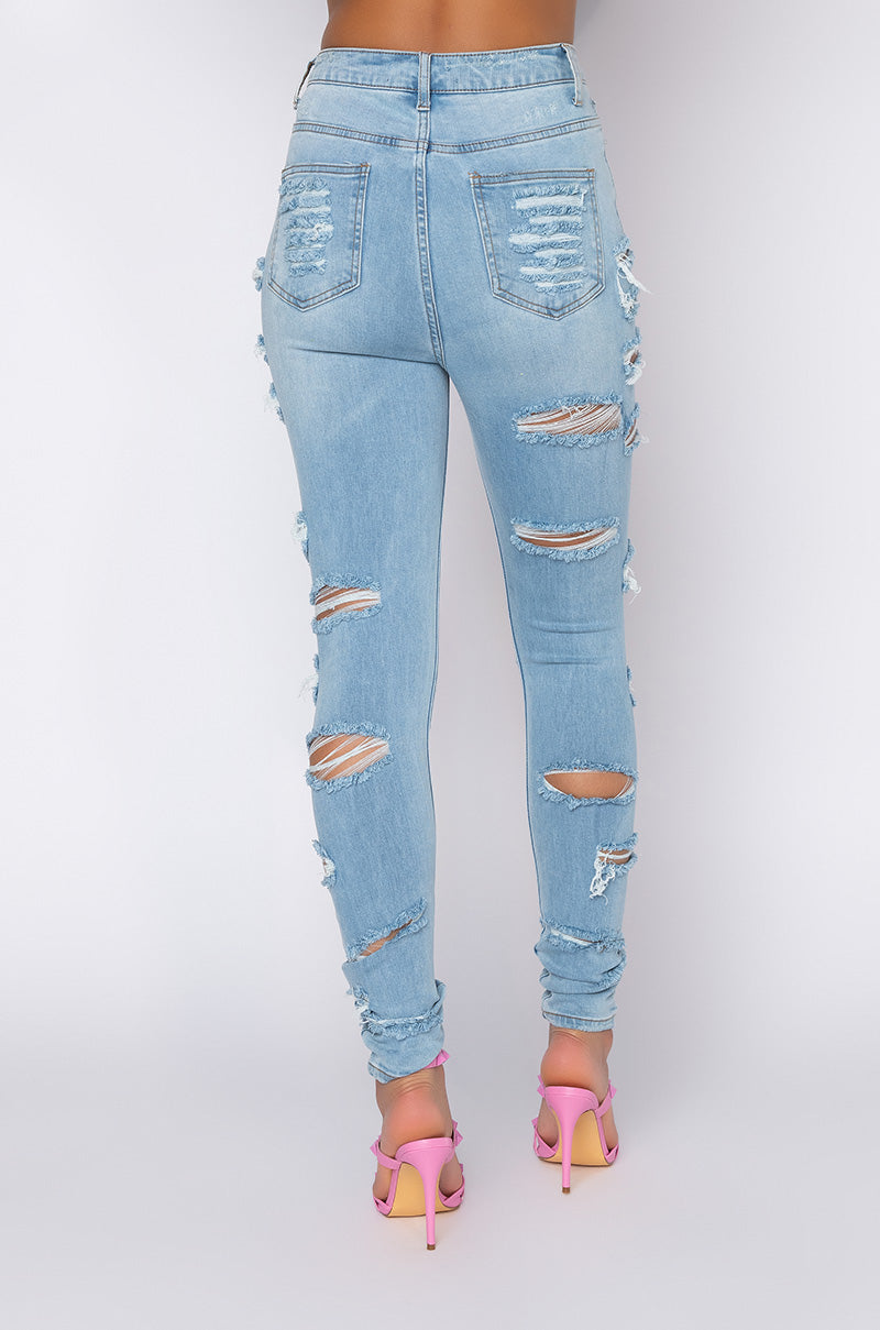 Back View Opposite Direction High Waisted Distressed Skinny Jeans in Light Blue Denim 2