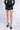 Front View Peekaboo Pocket Faux Leather Skirt 