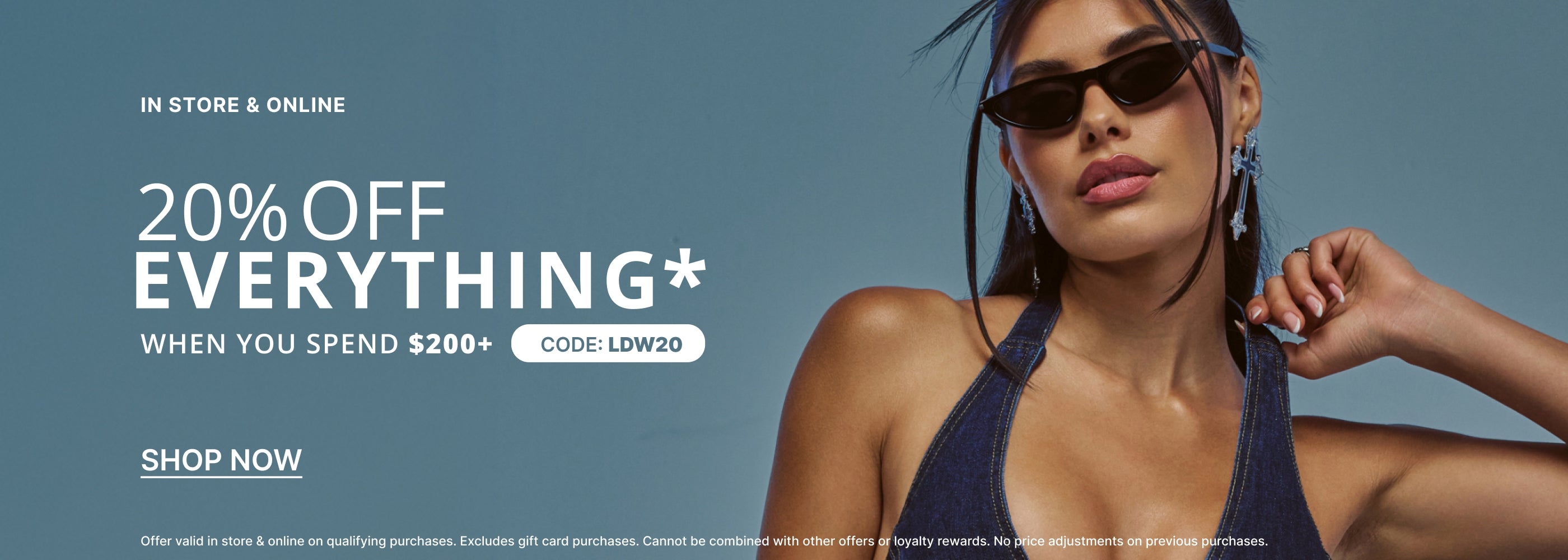 Promotional banner featuring a woman in sunglasses and a dark halter top against a blue-gray background, with large text reading '20% OFF EVERYTHING' and 'SHOP NOW'.