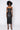 Front View Pretty Lady Pleather Midi Dress With Cut Out in Black