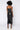 Back View Pretty Lady Pleather Midi Dress With Cut Out in Black