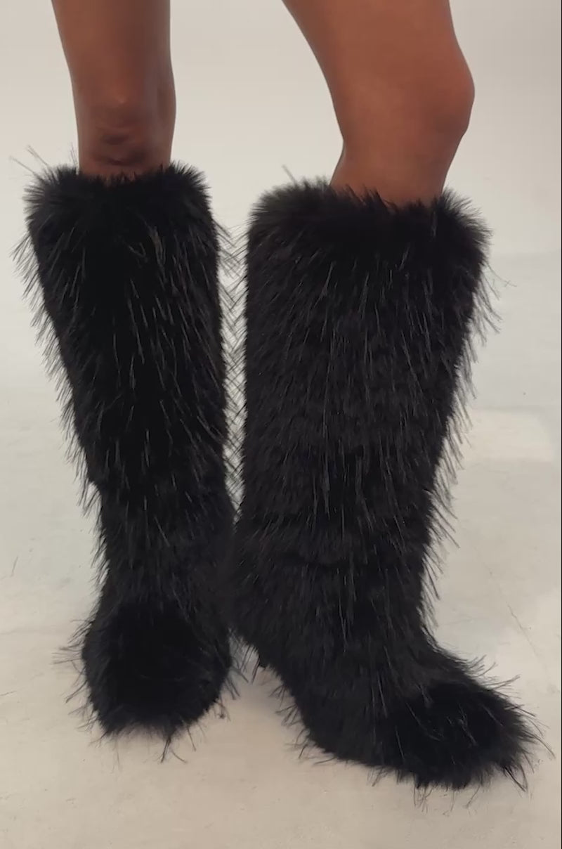 Video of woman modeling the AZALEA WANG UPSTARTER BLACK STILETTO FUR BOOT 
