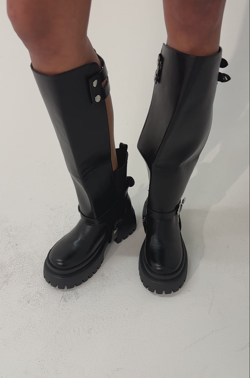 Video of woman modeling the AZALEA WANG RAMPAGE BLACK DISTRESSED TWO PIECE COMBAT BOOTS