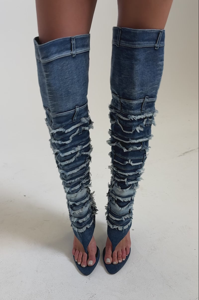 A video of a person wearing the AZALEA WANG SENA DENIM STILETTO OPEN TOE BOOTS.