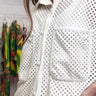 PICNIC MODE LASER CUT FAUX LEATHER BUTTON DOWN MINI DRESS IN WHITE